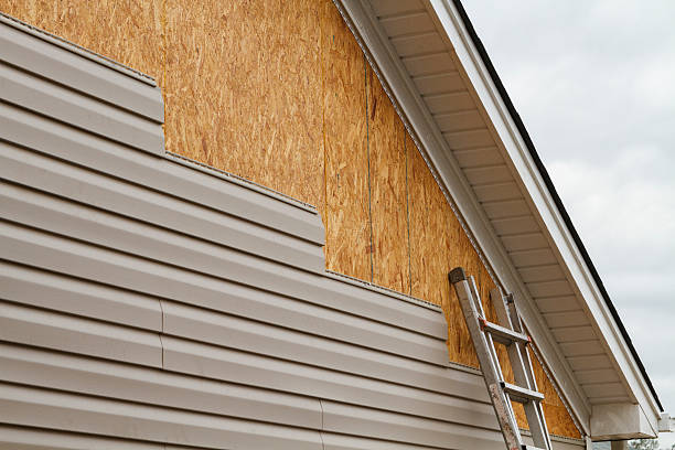 Professional Siding technician working in Climax, NC